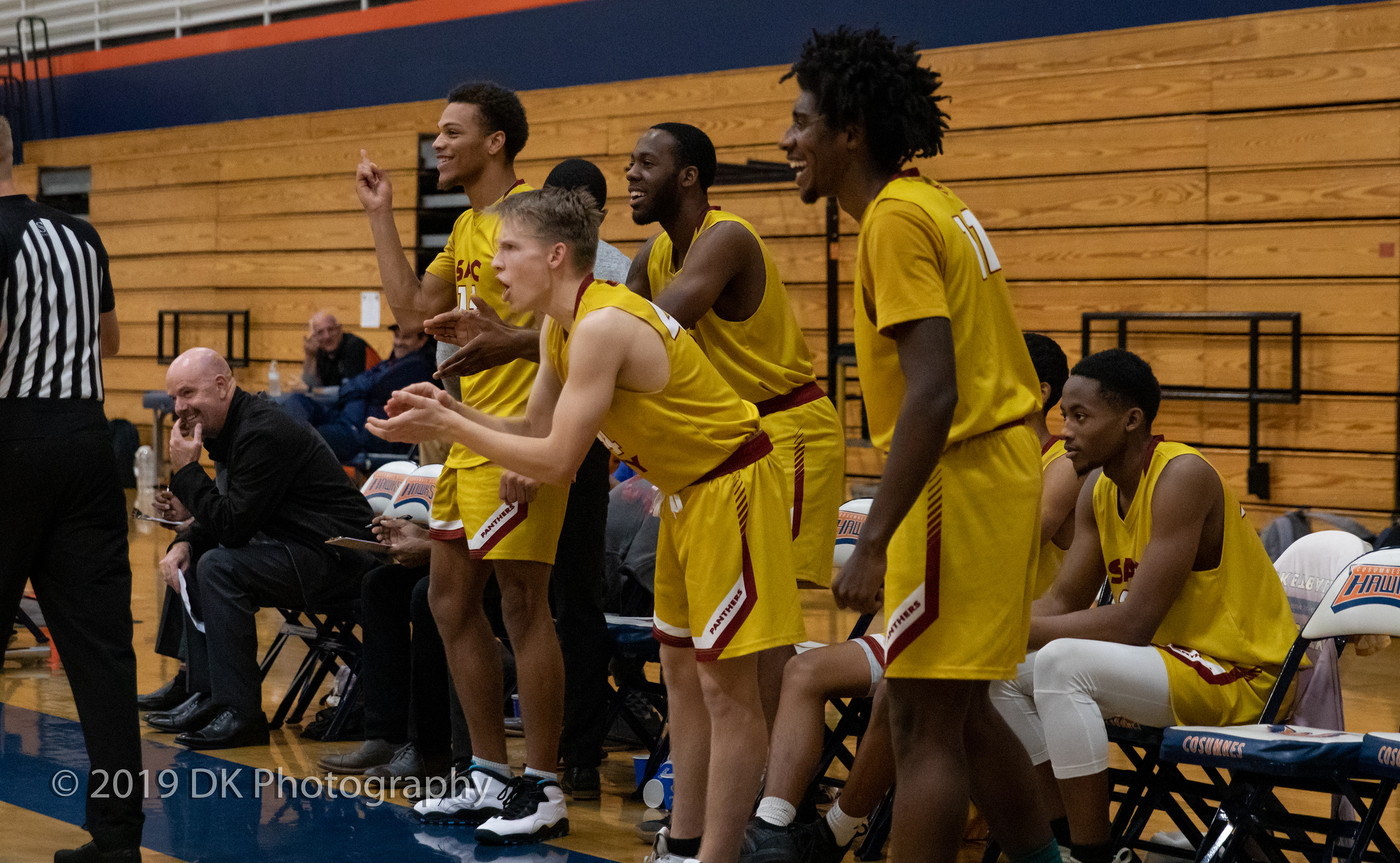 City College bench reacts after a great basket in the game against Merced College at the Cosumnes River Gym in the James Clark Classic on Dec. 5th. 