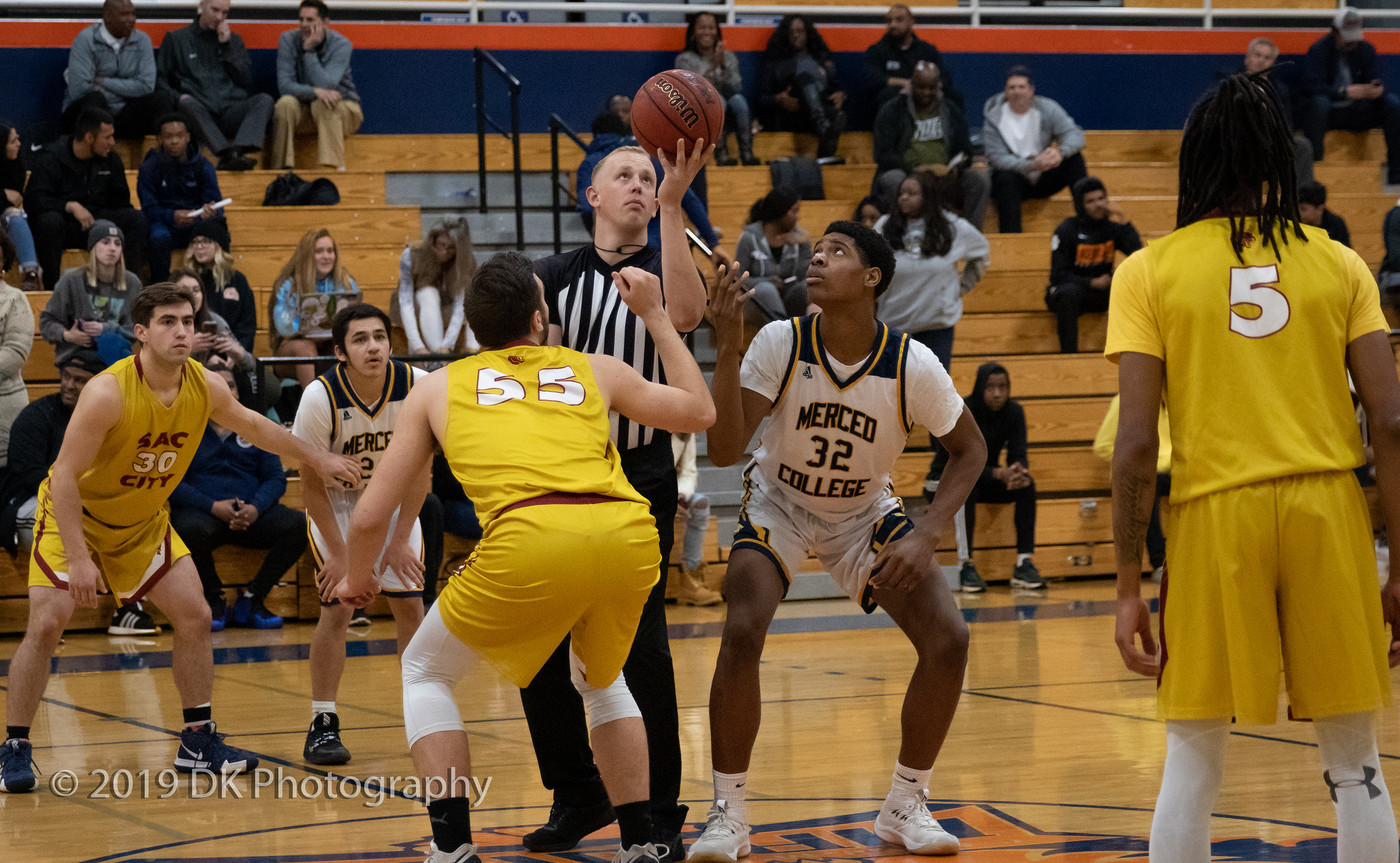 Terry Moody (#55), City College sophomore gets ready for the tip off in the game against Merced College at the Cosumnes River Gym in the James Clark Classic on Dec. 5th.