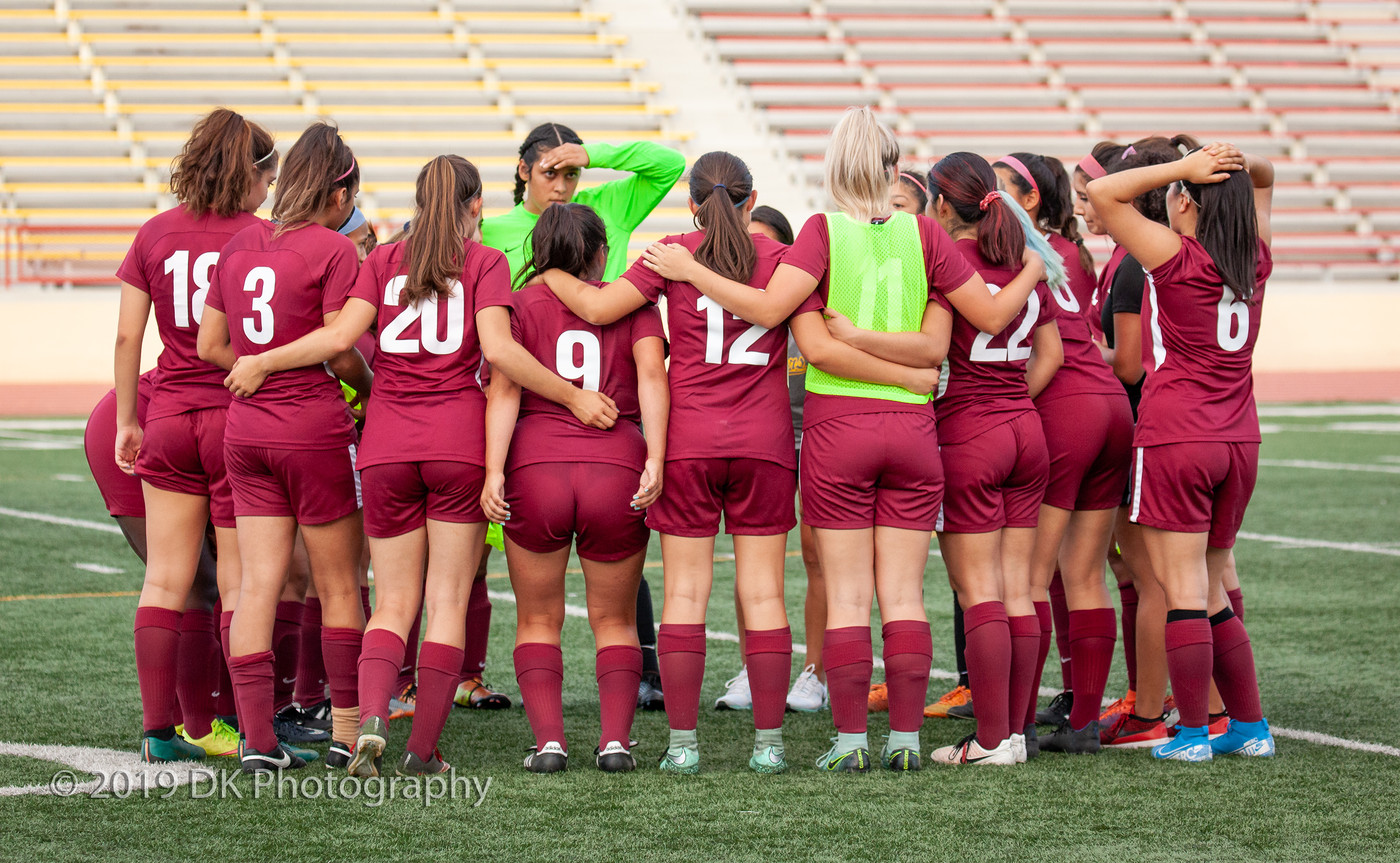 City College soccer team huddles before the start of the second half of the match against Yuba College at Hughes Stadium on Aug. 27th.