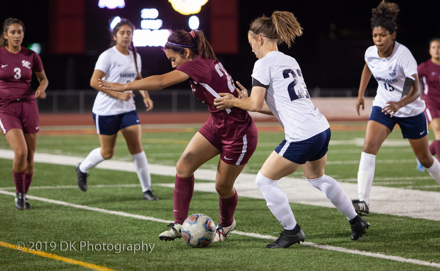 Karina Quintero (#22), City College  freshman fights for the ball in the match against Cosumnes River College at Hughes Stadium on Oct. 3rd.