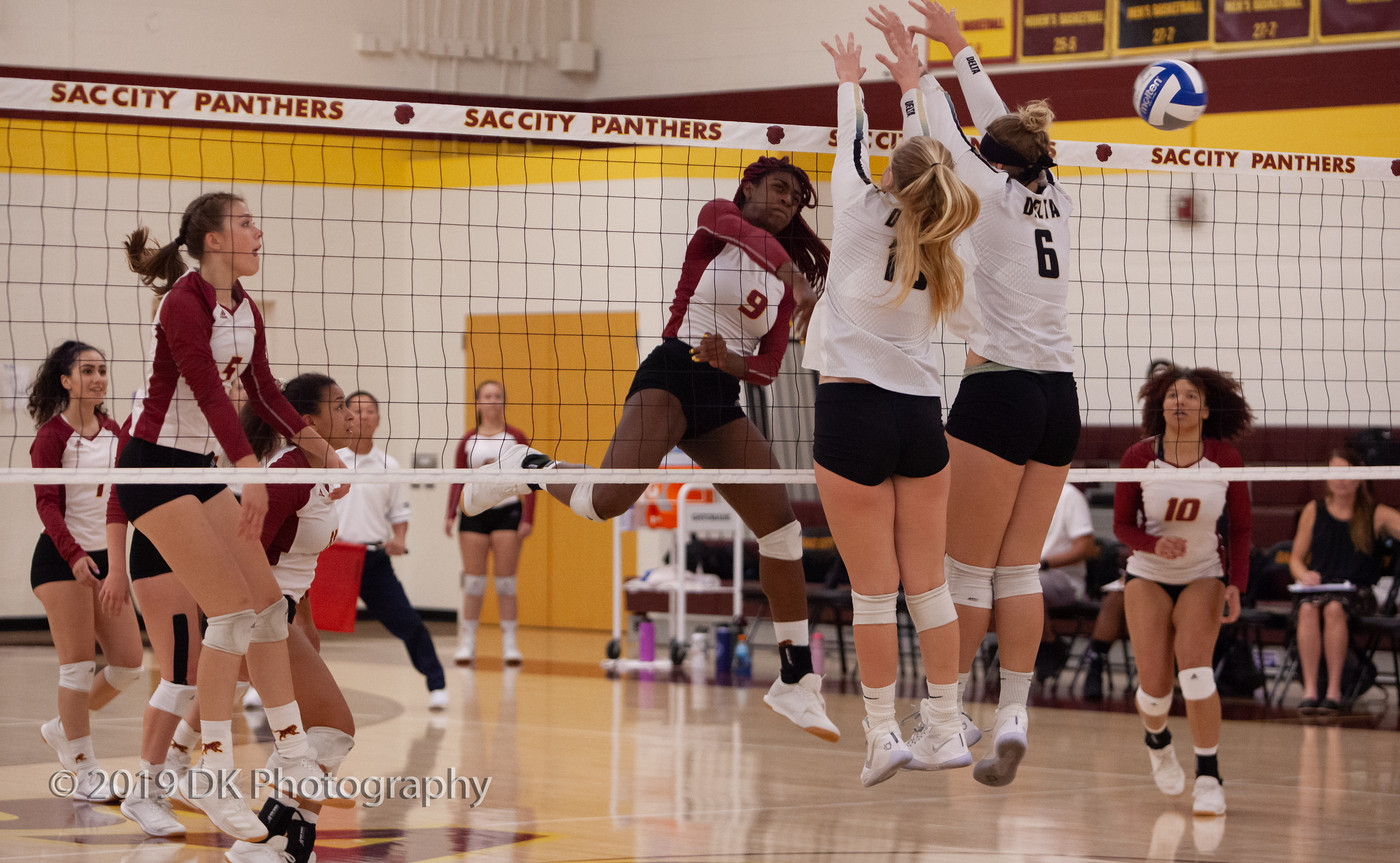 Jaylah Tate (#9), City College sophomore watches as her spike goes past the block attempt in the match against Delta College at the North Gym on Sept. 27th.