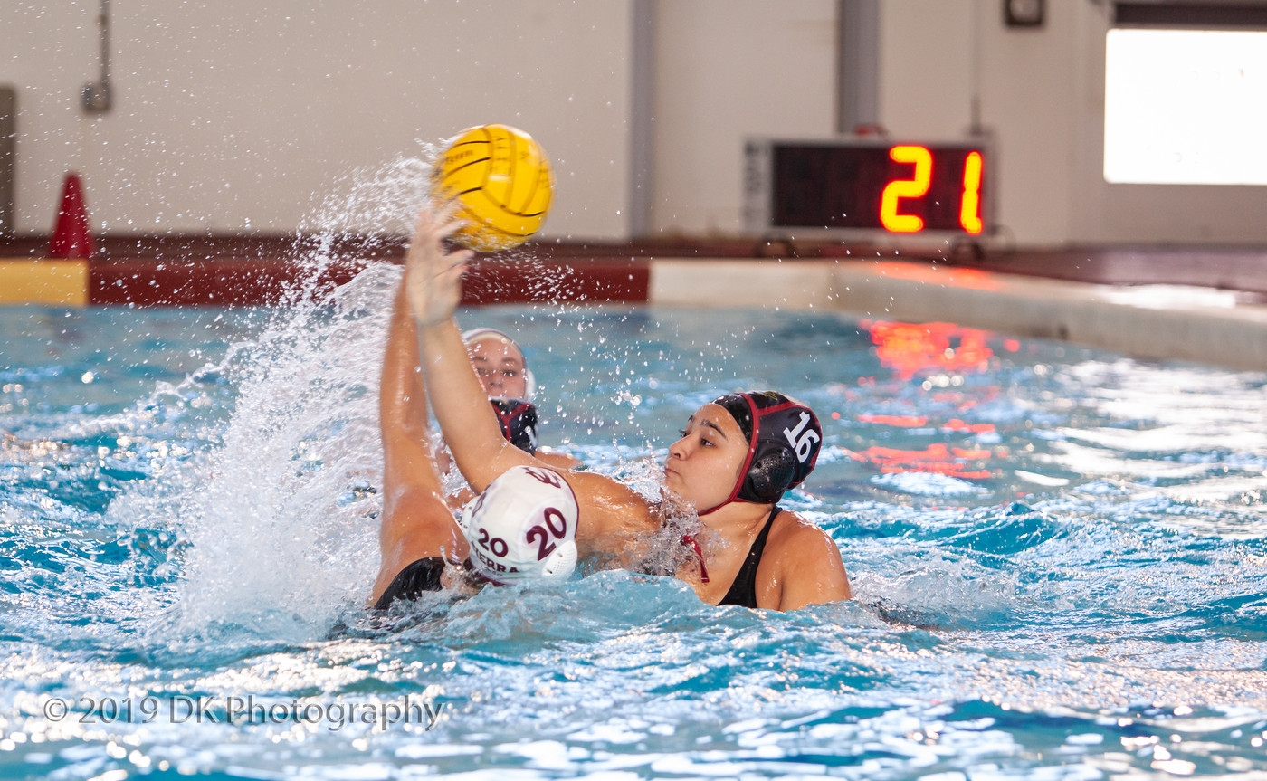 Jade Grey-Aleman (#16), City College freshman tries to block the shot in the match against Sierra College at Hoos Pool on Oct. 9th. 
