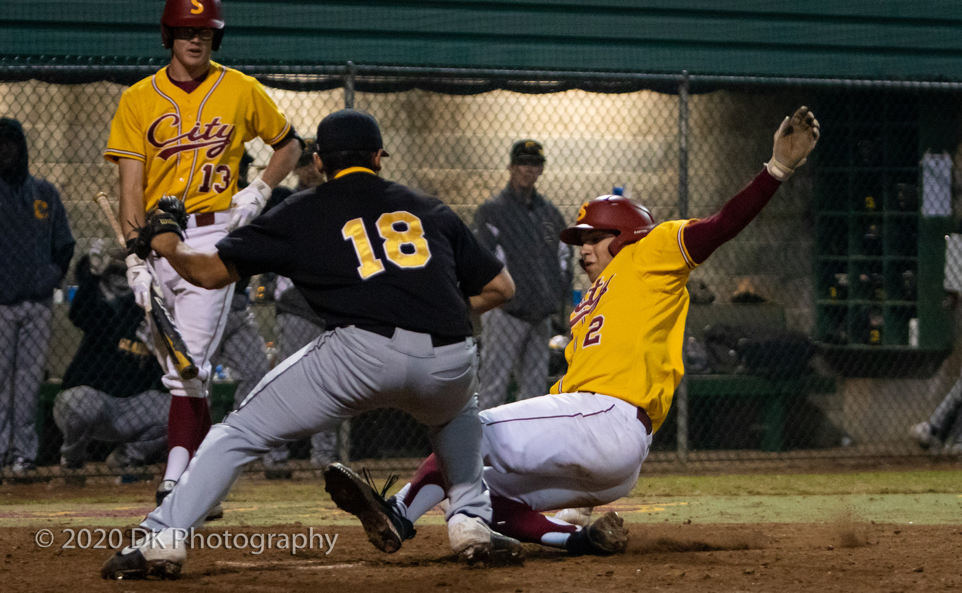 City College sophomore Noah McCoy (#2) steals home on a wild pitch in the game against Chabot College at Union Stadium on Jan. 31st. 