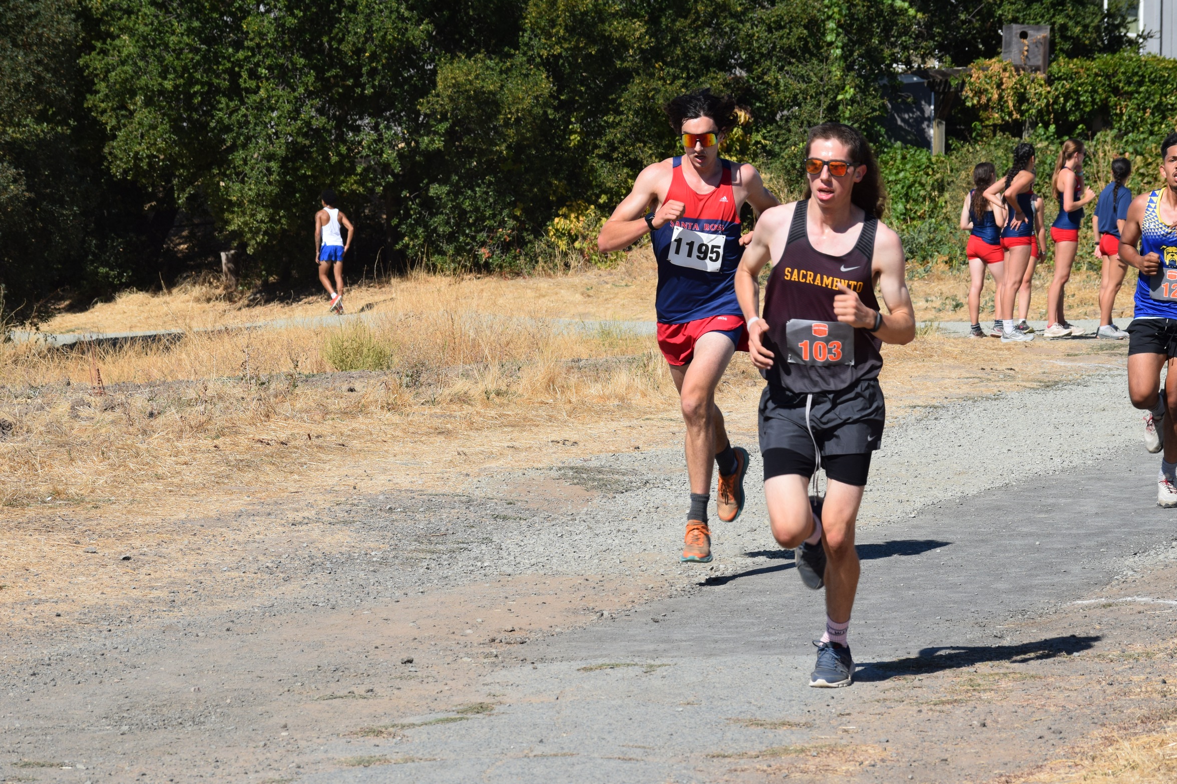 Hicks crosses the line first for SCC and in 26th place overall followed by teammates York (32nd) and Ortiz (33rd);  City is 6th at the Big 8 Championships