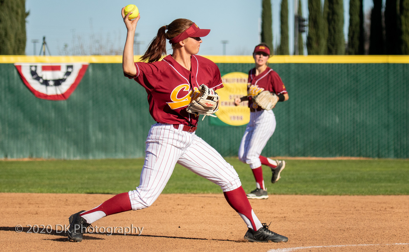 Mia Santos (#12), City College sophomore makes the throw to first for the out in the second game of a double header against Merced College at The Yard on Feb. 11th.