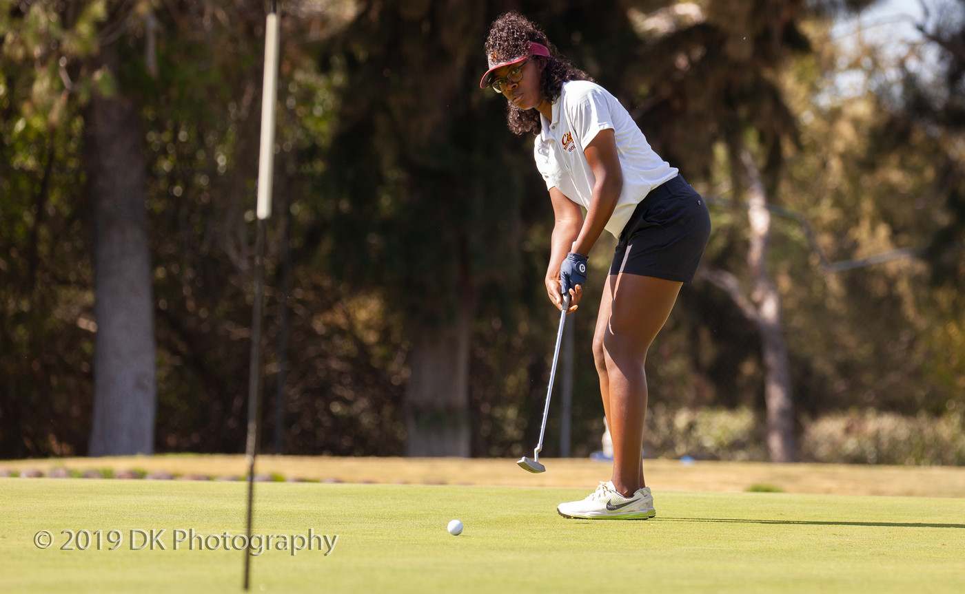 Yunique Williams, City College sophomore stares down her put at the 3rd hole at the Jan High Memorial at Bing Maloney Golf Course on Oct. 8th.
