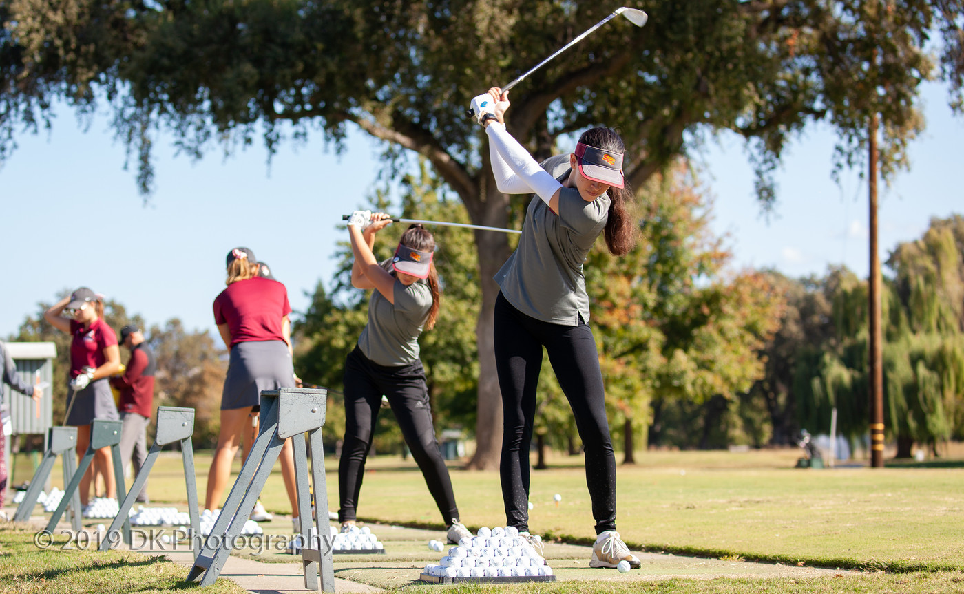 City College's Gabriella Herrera (left) and Savannah Gonsales warm up before the Big 8 #7 Golf Tournament at Butte Country Club Golf Course on Oct. 17th.