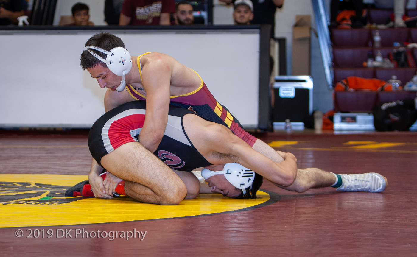 Raul Ortiz, City College sophomore fights hard in his final match against Anthony Chavez of Fresno City College at the Sac City Invite in the North Gym on Sept. 21st. 