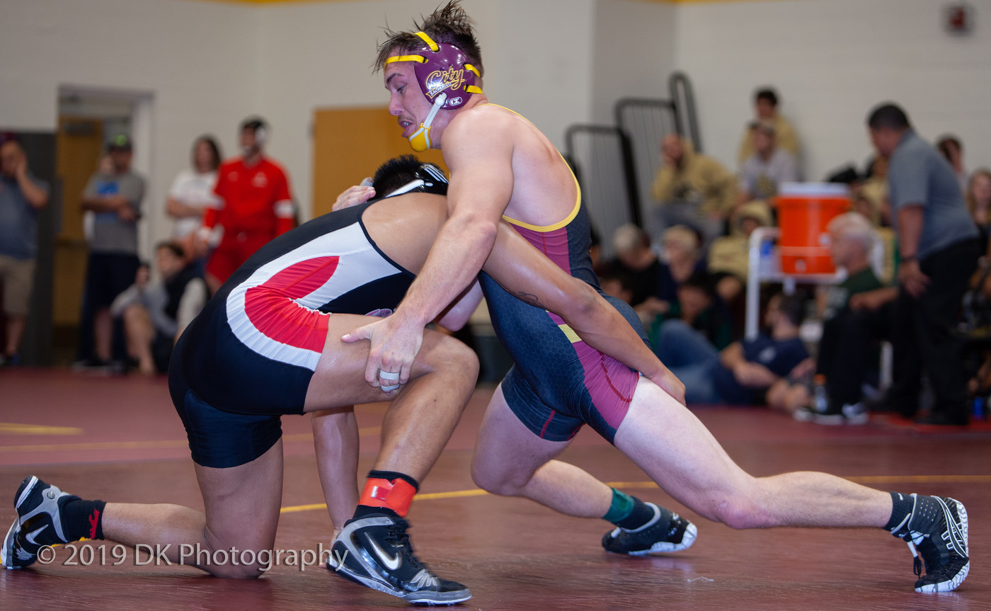 Chase Miles, City College sophomore fights hard in his final match against Arthuro Rivas of Fresno City College at the Sac City Invite in the North Gym on Sept. 21st.