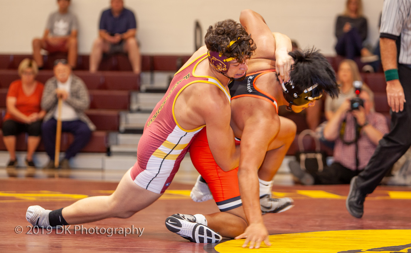 Steven Karas, City College freshman gets the take down in his match against  Randy Nemendez from Lassen College at the North Gym on Oct. 9th.