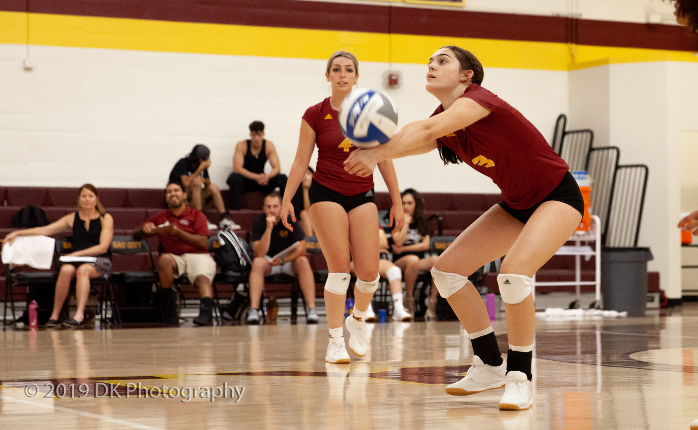 Camrynn Peterson (#3), City College sophomore digs the ball in the match against Redwoods College in the North Gym on Sept. 4th.