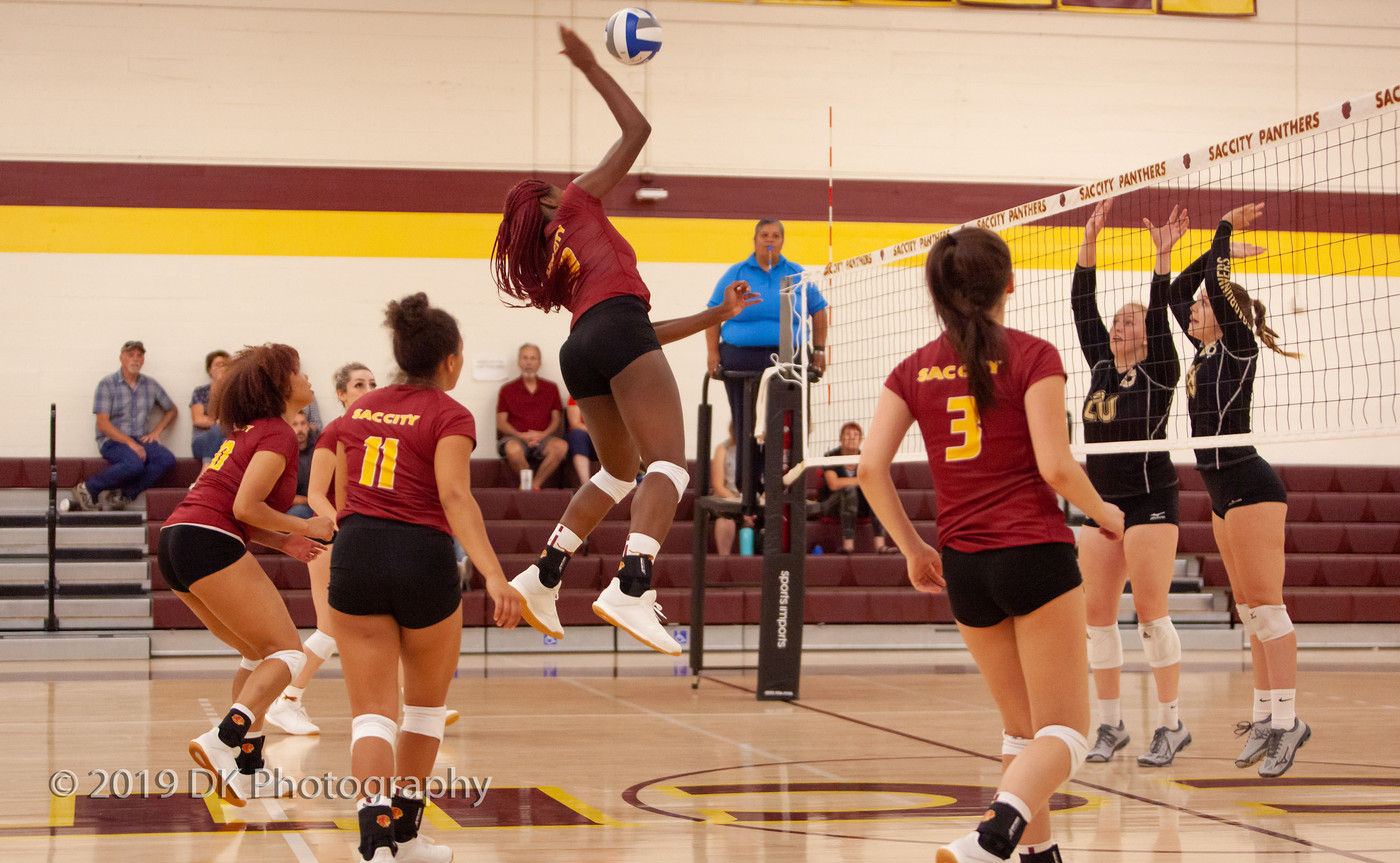 Jaylah Tate (#9) City College sophomore goes up for the spike in the match against Butte College at the North Gym on Aug. 30th.