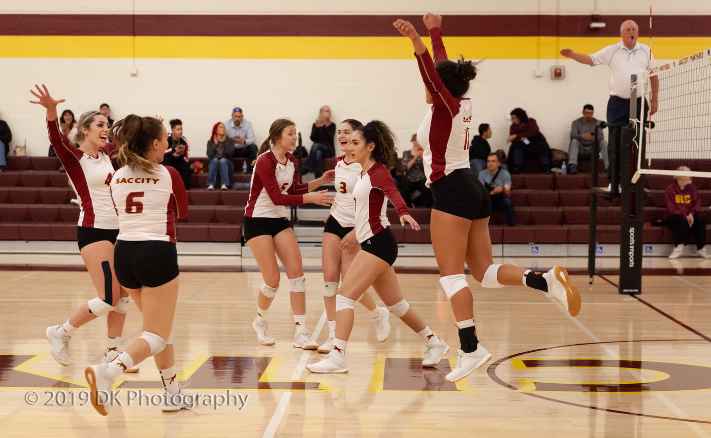 City College volleyball team reacts after winning the point in the match against Sierra College at the North Gym on Oct. 9th.