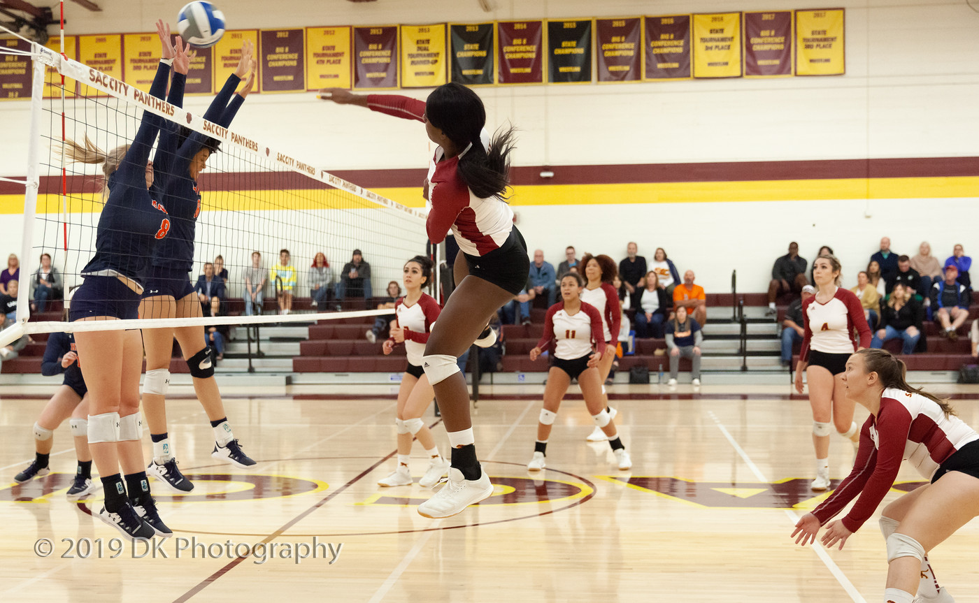 Jaylah Tate, (#9), City College sophomore spikes the ball in the match against Cosumnes River College at the North Gym on Oct. 18th. 