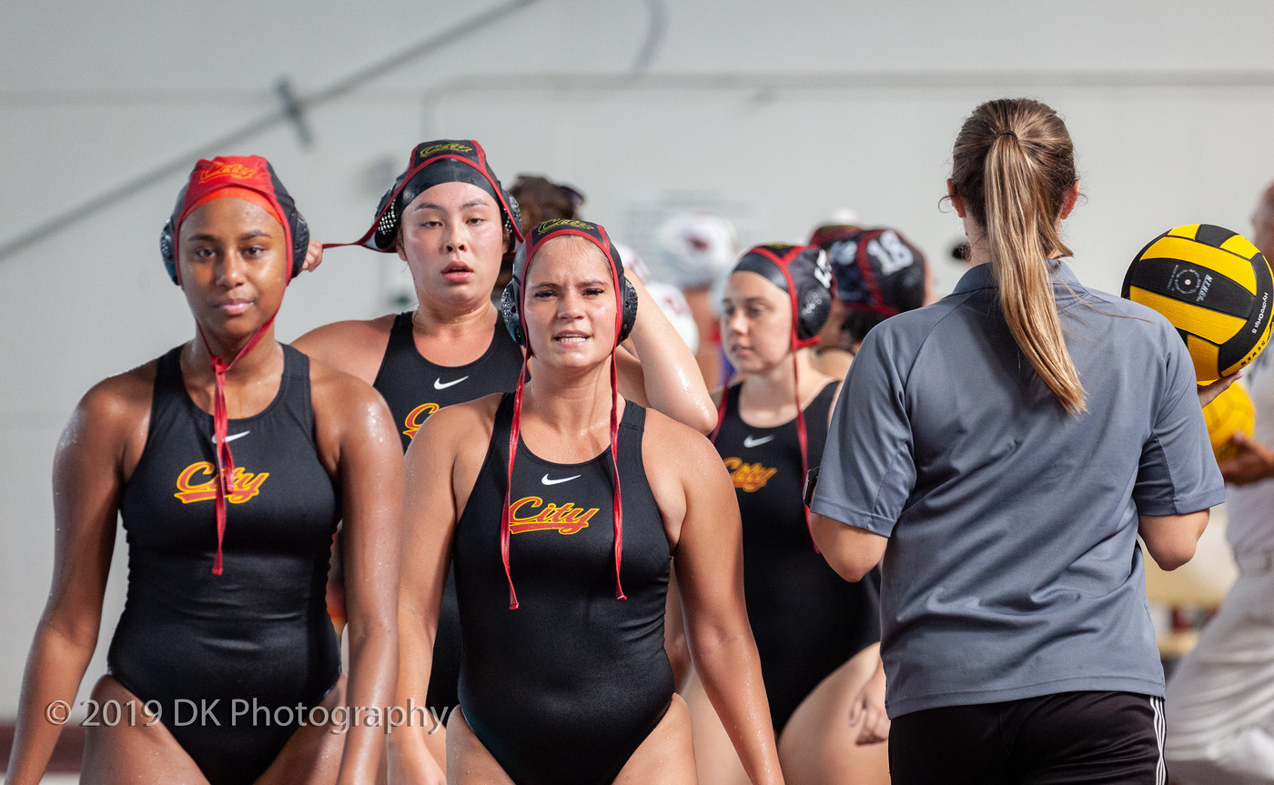 City College's Martha Shrader (left), Kealani Burke (center) and Isabella Pfeffer (right) react after the close match against Fresno City College at the Hoos Pool on Sept. 18th.