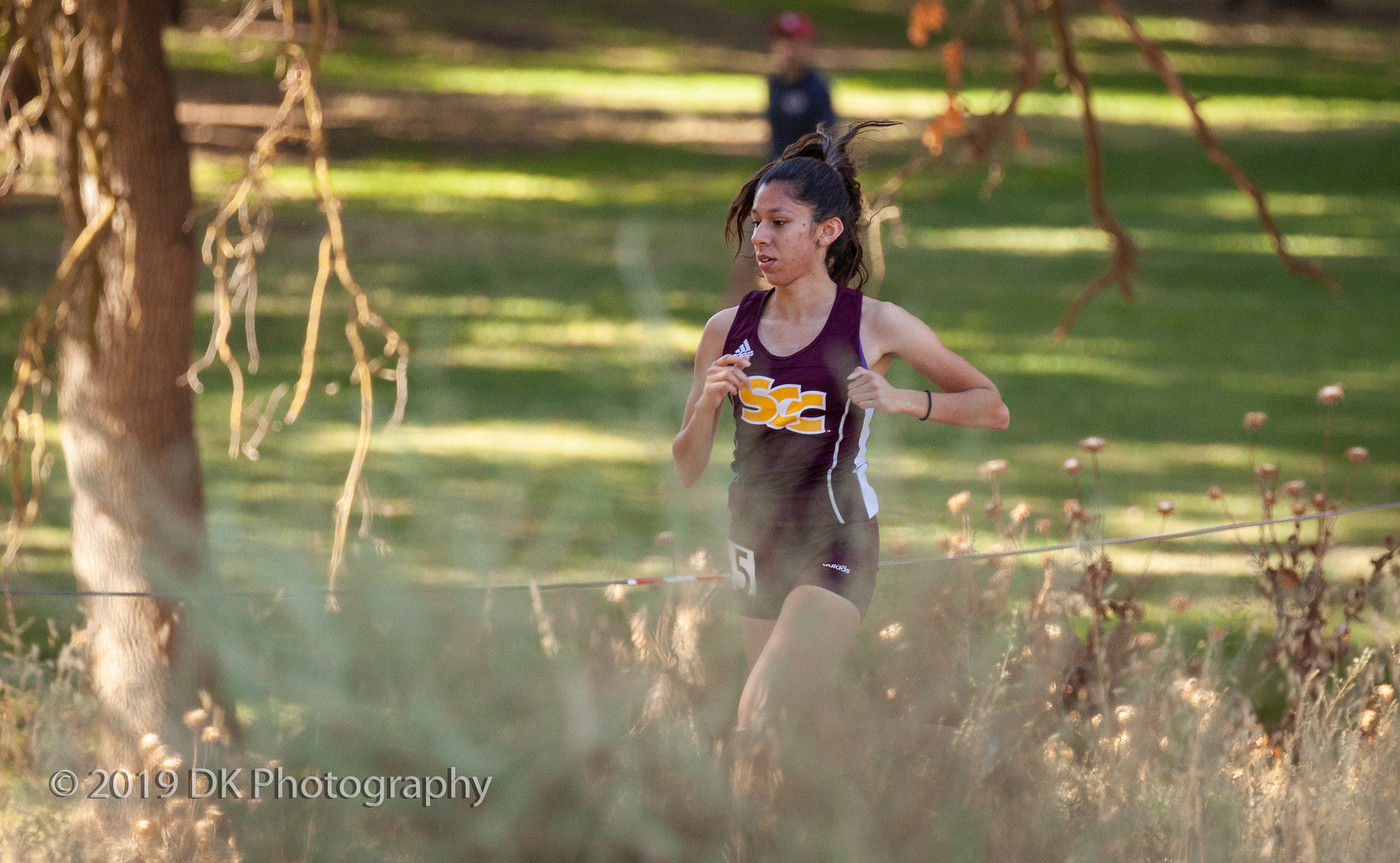 Maritza Tellez, City College sophomore gets close to the finish line at the Big 8 Final at Tuolumne River Regional Park on Nov. 1st. 