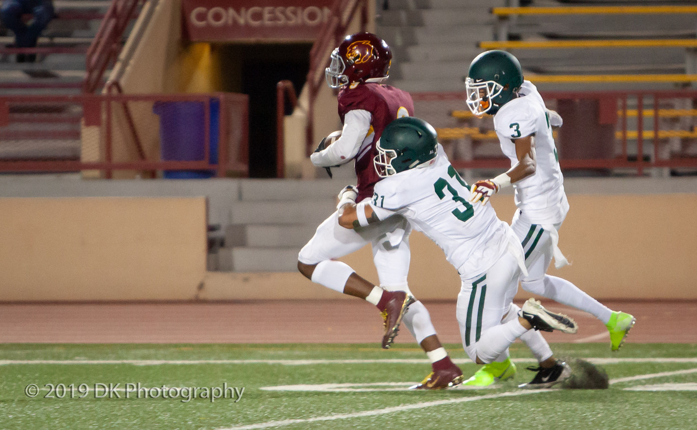 City College wide receiver Robert Harrison (#3) makes the catch and gets pulled down just short of the end zone against Diablo Valley at Hughes Stadium on Sept. 21st.
